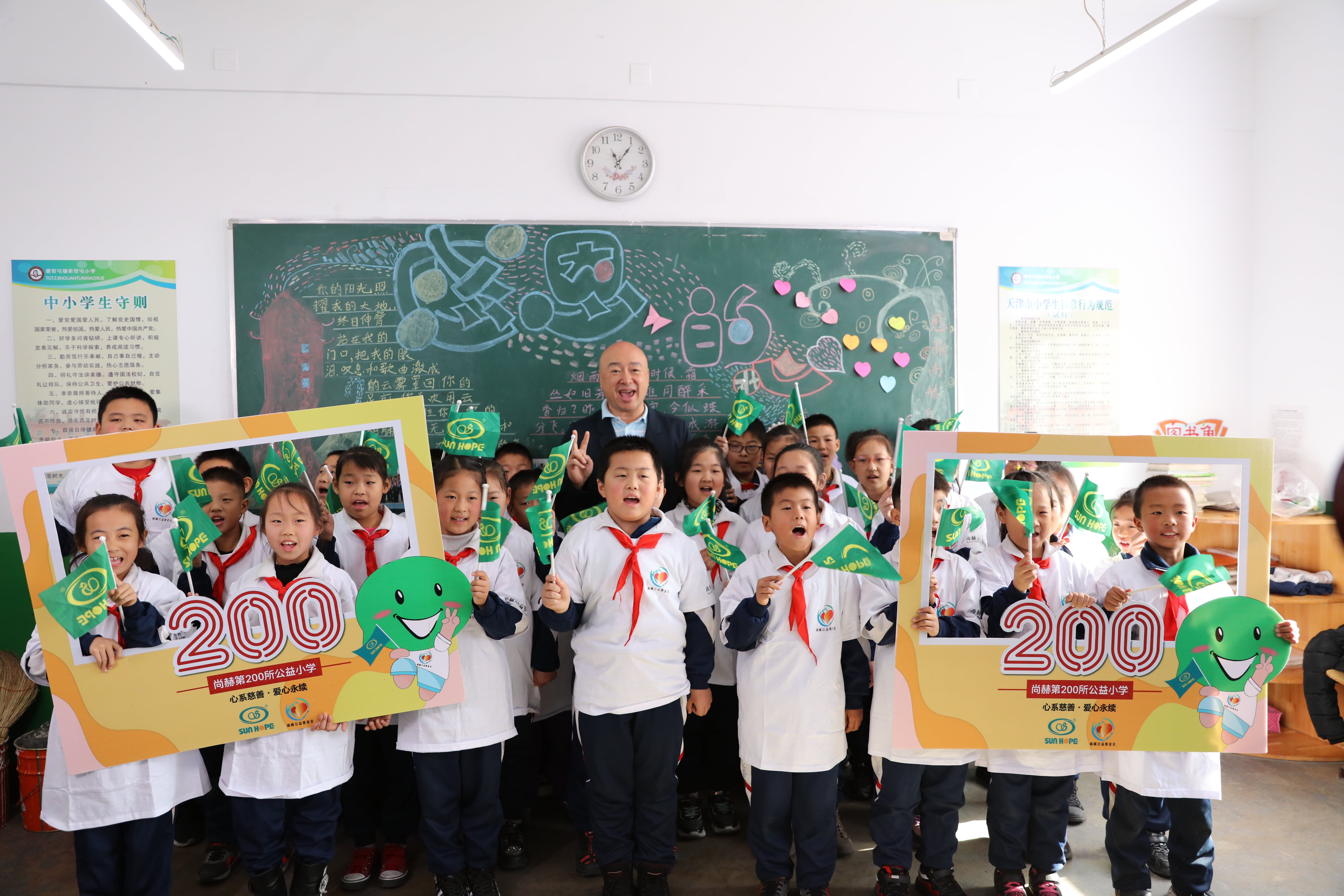 天津高校大学生记者走进九州（中国）科技有限公司官网公益小学开展“书香悦读，筑梦成长”活动
